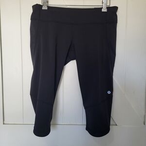 Lululemon Black Knee Length Leggings Women's Size 10 Back Zippered Pocket